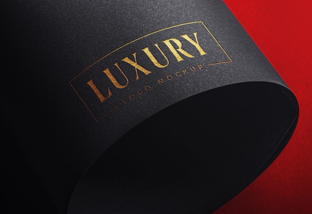 Download Luxury logo mockup on black craft paper | Premium PSD File