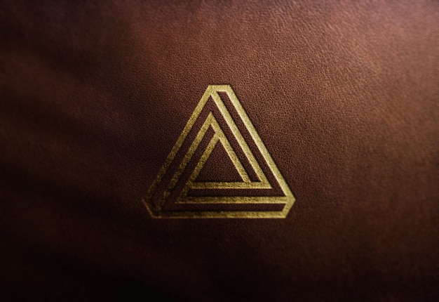 Luxury logo mockup on brown leather | Premium PSD File