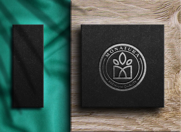 Download Premium PSD | Luxury silver logo mockup on a box