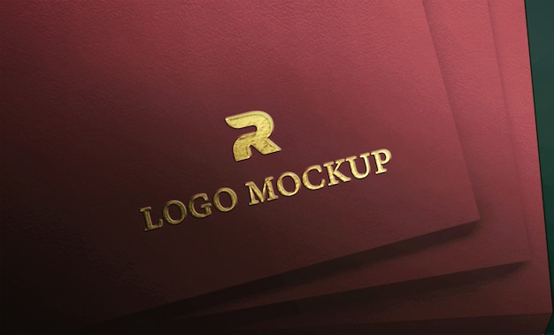 Download Premium Psd Luxuy Gold Embossed Logo On Red Textured Paper Mockup