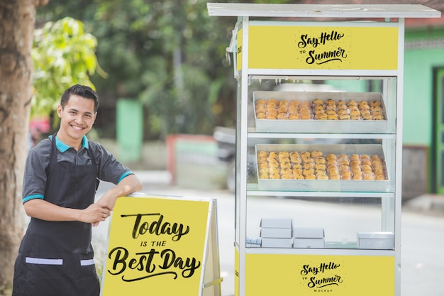 Download Man food stall seller with blank mockup | Premium PSD File