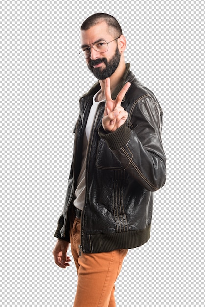 Download Man wearing a leather jacket doing victory gesture PSD ...
