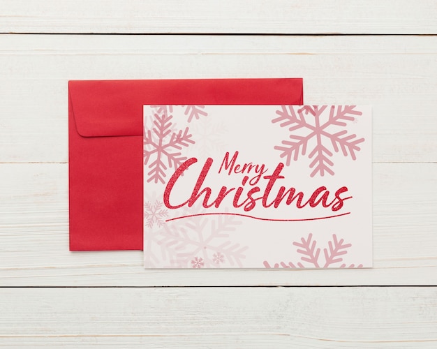 Premium PSD | Merry christmas greeting card and envelope mockup