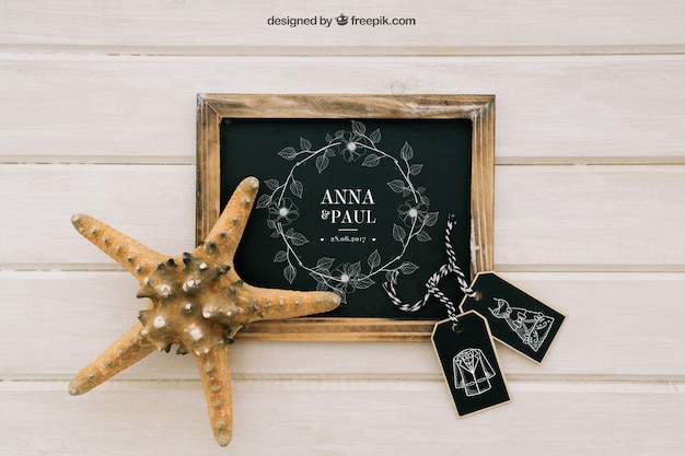 Mock up design with blackboard, labels and starfish PSD Template