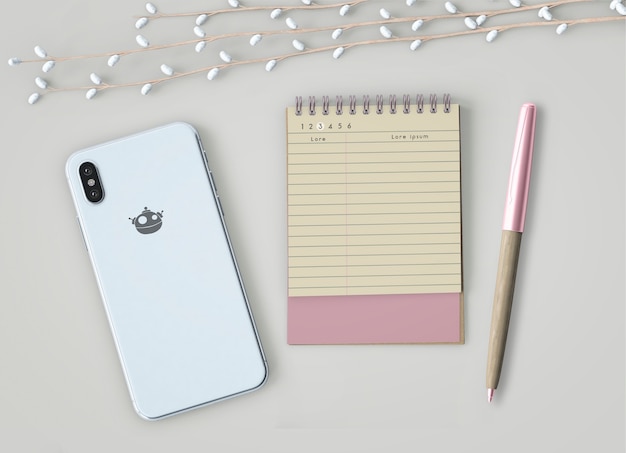 Mock up of notebook and smartphone Free Psd
