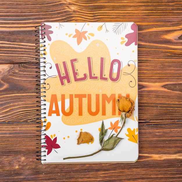 Mock-up notebook with hello autumn message Free Psd