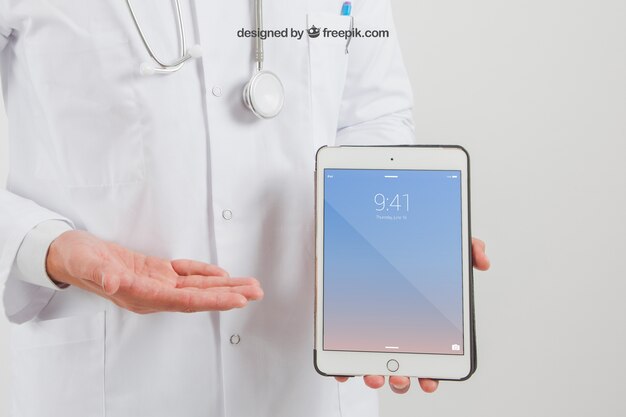 Download Mock up of tablet on doctor's hands PSD file | Free Download