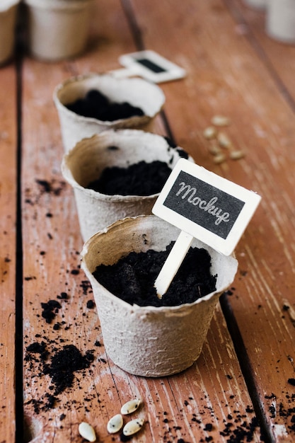 Download Free Psd Mock Up Plant Pots Filled With Soil High View