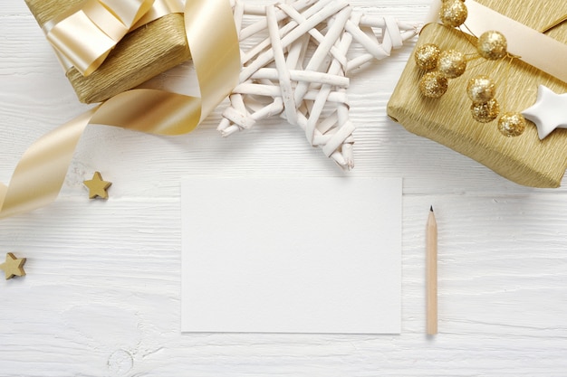 Download Mockup christmas greeting card with gold gift ribbon ...