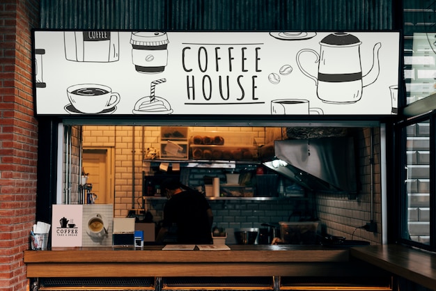 Free PSD | Mockup of a coffee house shop
