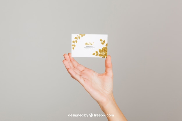 Download Mockup concept of hand holding business card PSD file | Free Download