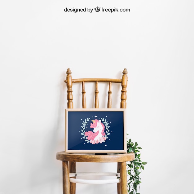 Download Mockup of frame on chair | Free PSD File