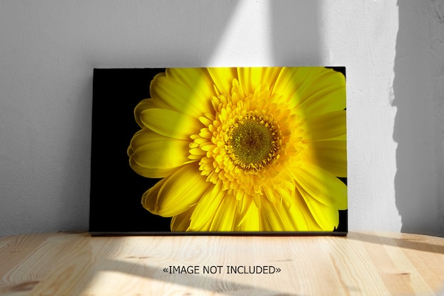 Download Premium Psd Mockup Horizontal Blank Canvas On Wooden Table White Wall With Shadows PSD Mockup Templates