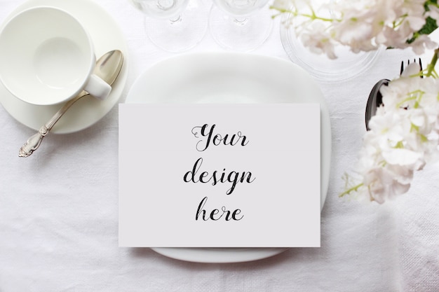 Download Mockup of a menu card on a plate on arranged table ... PSD Mockup Templates