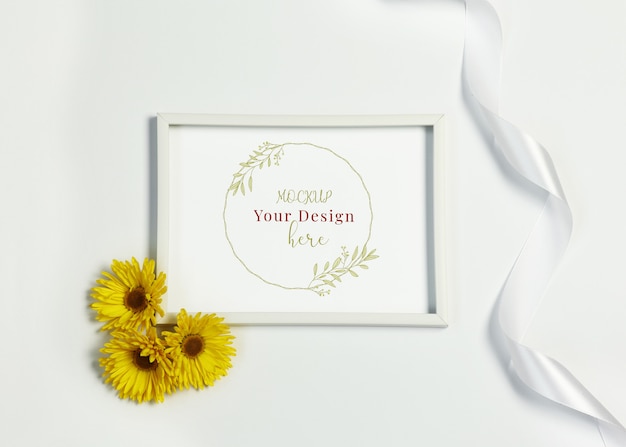 Download Premium Psd Mockup Photo Frame With Yellow Flowers And Ribbon On White Background PSD Mockup Templates