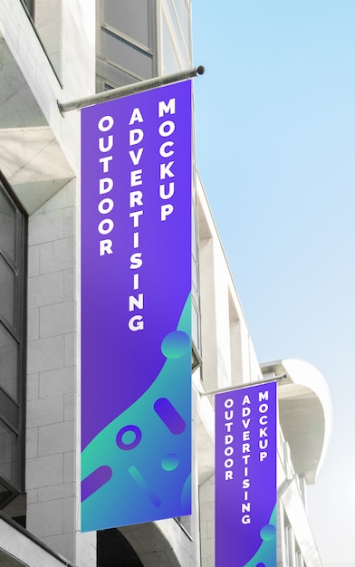 Download Mockup of the street city outdoor poster banner advertising on the vertical flag | Premium PSD File