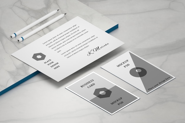 Download Premium Psd Mockup Template With A4 Paper Sheet And Two Business Cards On Marble Surface With Two Pencils PSD Mockup Templates