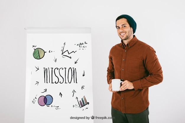 Modern man posing with whiteboard and mug PSD Template