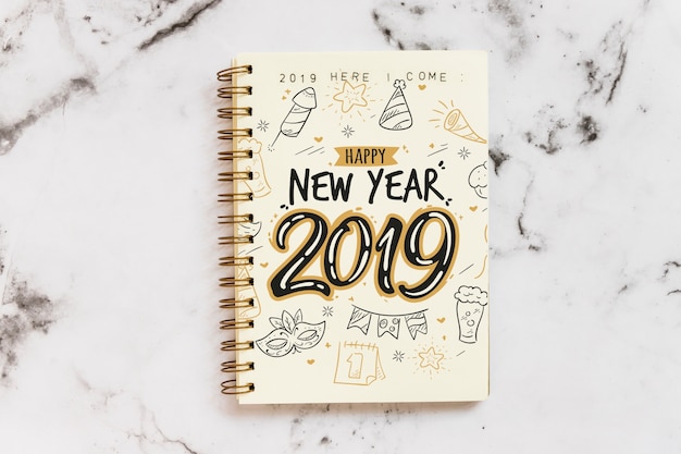 Notebook mockup with new year concept Free Psd