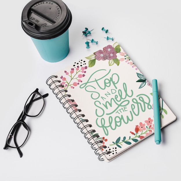 Notebook mockup with take away coffee cup Free Psd