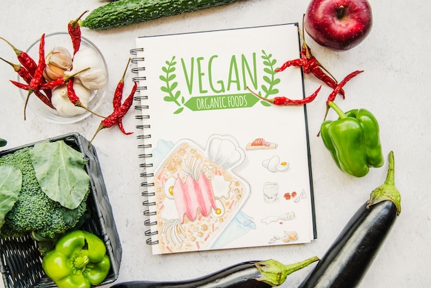 Download Free Notebook Mockup With Vegan Food Psd Mockup PSD Mockups.