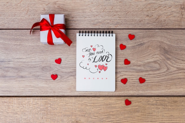 Download Notepad mockup next to gift box for valentine PSD file ...