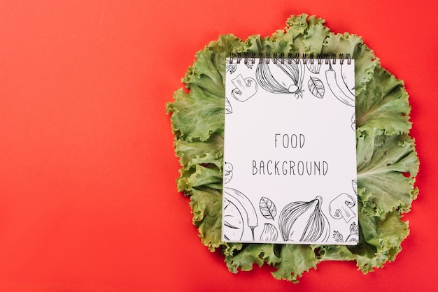 Download Notepad mockup on salad PSD file | Free Download