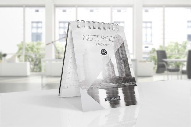 Download Premium PSD | Notepad mockup on table