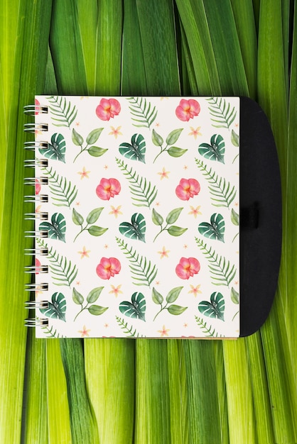 Download Notepad mockup with tropical leaves PSD file | Free Download