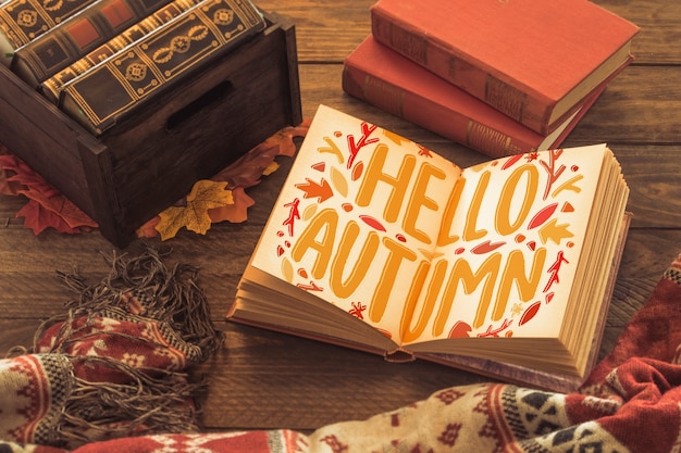 Download Open book mockup with autumn concept | Free PSD File