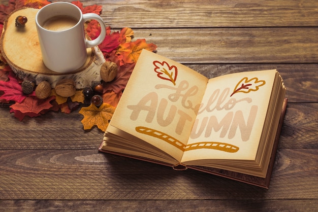 Download Open book mockup with autumn concept | Free PSD File