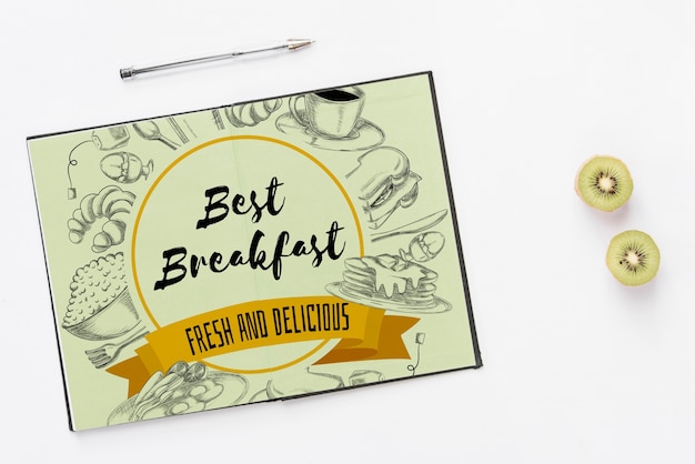 Download Free PSD | Open notebook mockup with breakfast concept