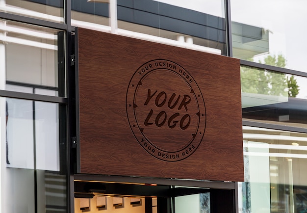 Download Outdoor engraved wood sign on shop front window mockup ...