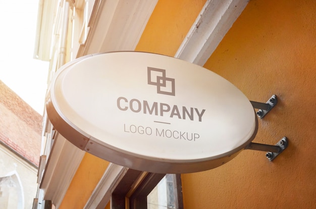 Download Free Oval Shape Signage Logo Mockup In Old City Center Premium Psd File Use our free logo maker to create a logo and build your brand. Put your logo on business cards, promotional products, or your website for brand visibility.