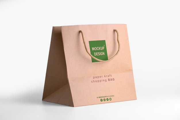 Download Premium Psd Paper Bag Brown Mockup For Merchandise Corporate Packaging Template With Logo Psd Three Quarters View Editable Kraft Package Yellowimages Mockups