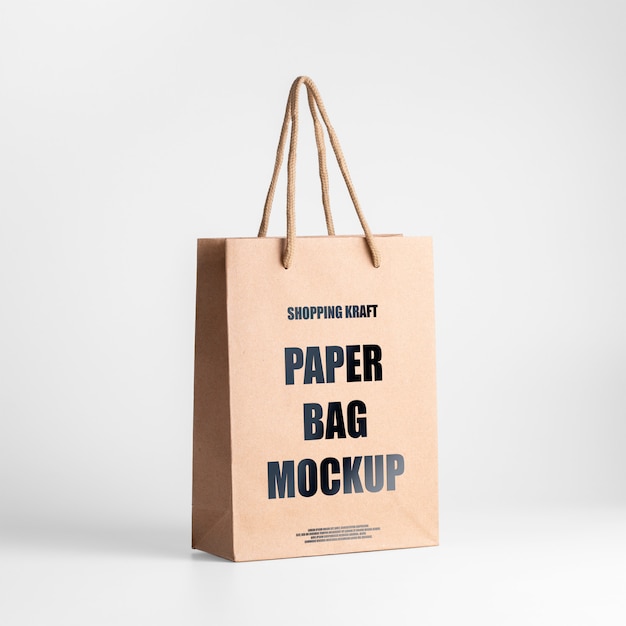 Download Premium Psd Paper Bag Brown Mockup Three Quarters View Editable Kraft Bag PSD Mockup Templates