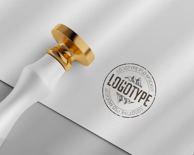 Download Premium Psd Paper Logo Mockup With Gold Round Rubber Stamp PSD Mockup Templates