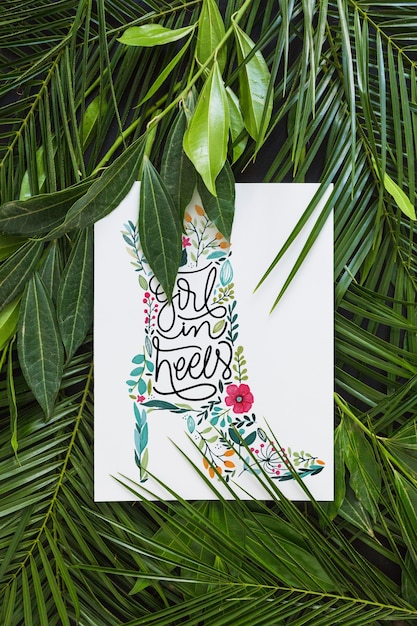Download Paper mockup within tropical leaves PSD file | Free Download