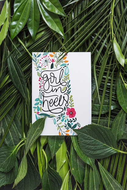 Download Paper mockup within tropical leaves | Free PSD File