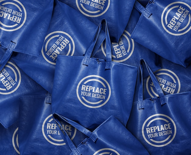 Download Premium PSD | Pile of blue leather tote bag mockup