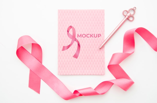 Free PSD | Pink ribbon and key cancer awareness mock-up