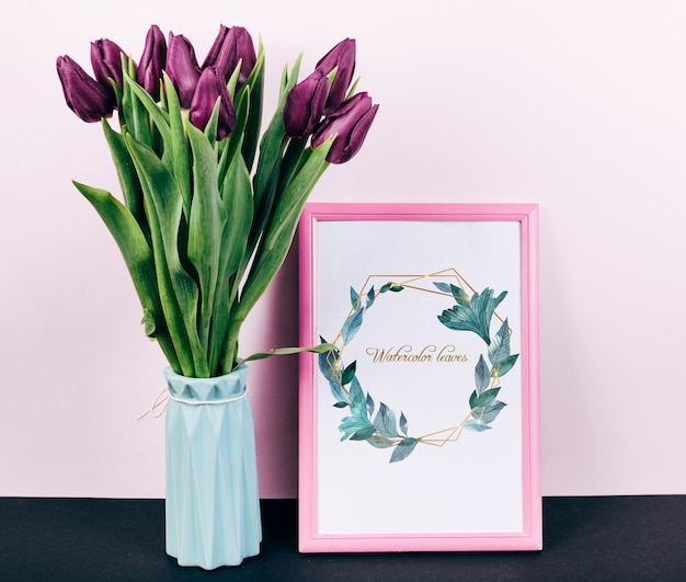 Download Pink spring frame mockup with bouquet of tulips | Free PSD File