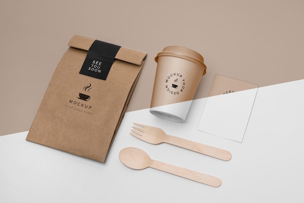 Download Free PSD | Plastic cup and paper bag with coffee mock up