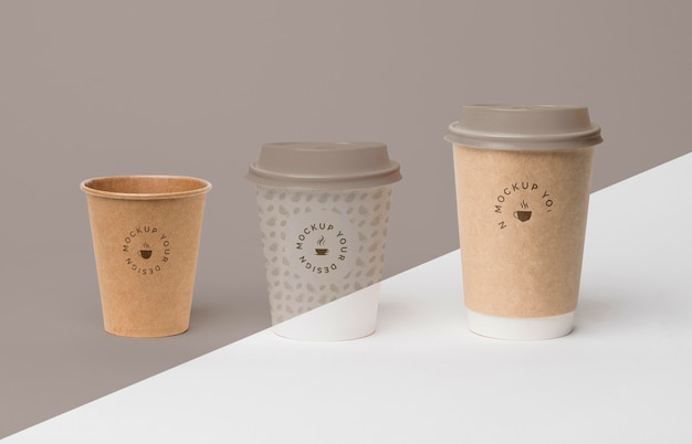 Download Free PSD | Plastic cup with coffee mock up on table