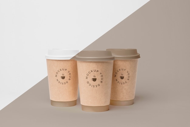 Download Free PSD | Plastic cup with coffee mock up on table