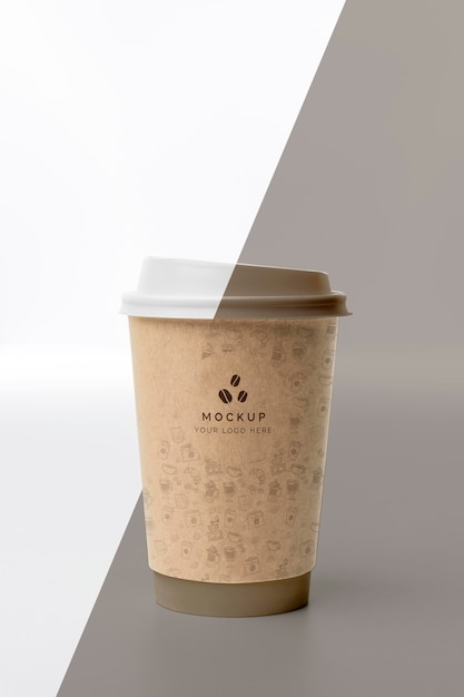 Download Free PSD | Plastic cup with coffee mock up on table