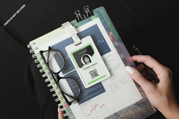 Download Premium Psd Plastic Id Card On Spiral Notepad In Woman S Hands Mockup PSD Mockup Templates