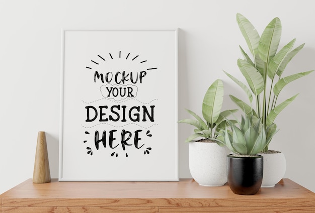 Download Free PSD | Poster frame mockup on the wall with plant