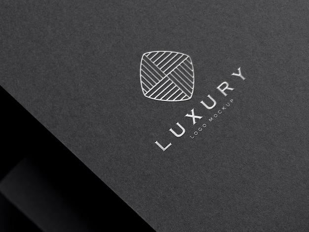 Premium PSD | Realistic silver embossed luxury logo mockup