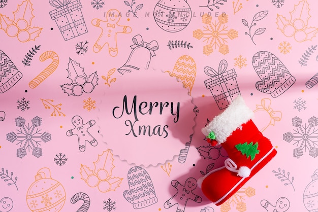 お祝いの装飾が施された赤いクリスマスソッキング メリークリスマスメッセージ プレミアムpsdファイル